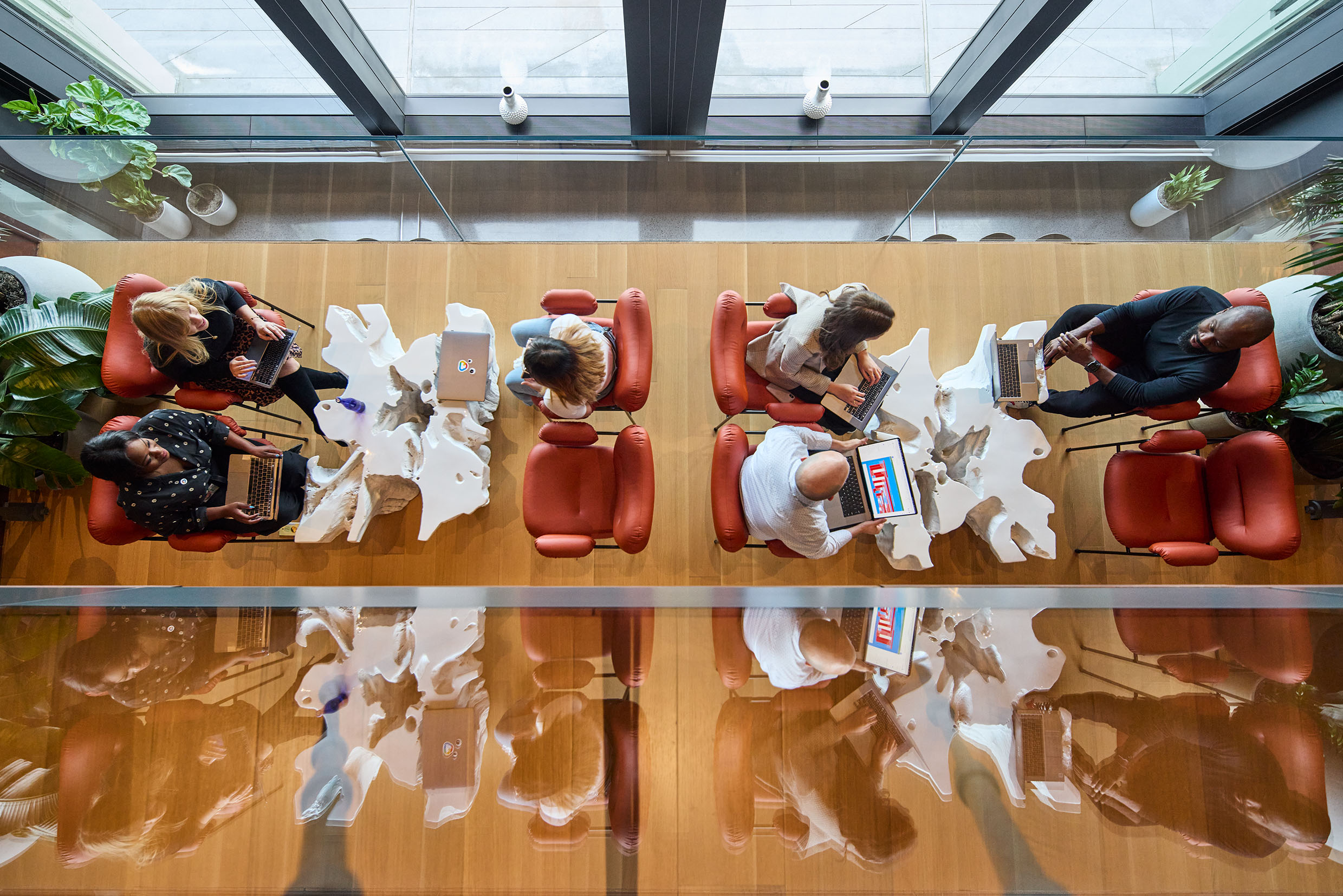 Arial Photo of people in a cafe with laptops